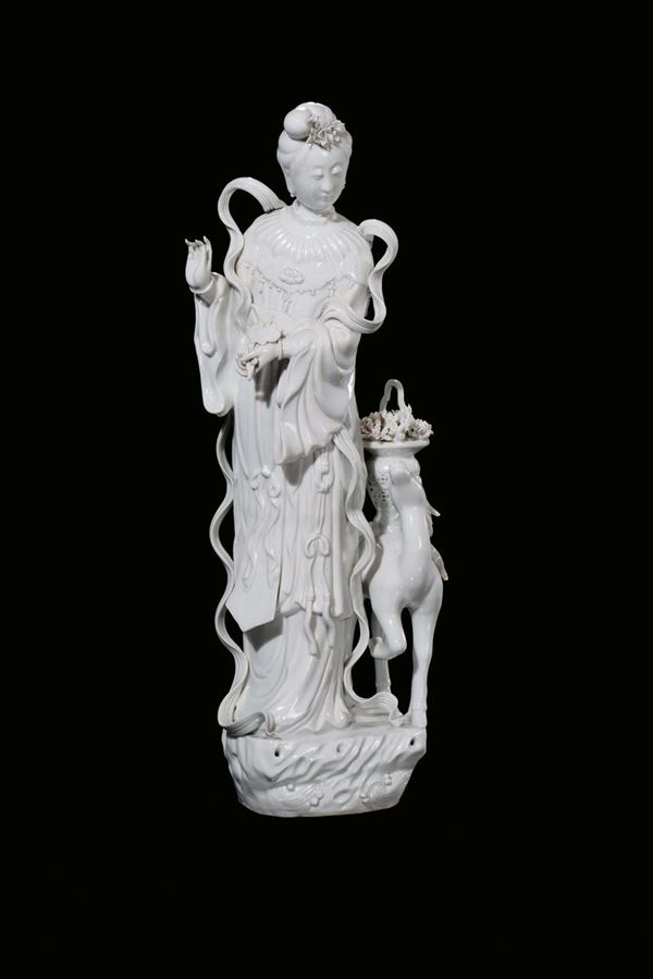 A large Blanc de Chine porcelain figure of Guanyin with fawn , China, Republic, early 20th century