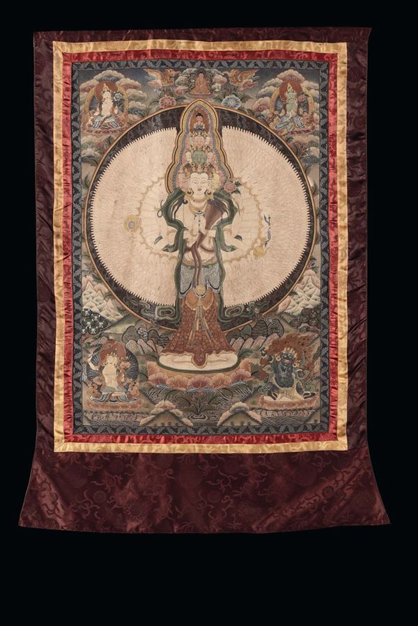 A Thangka decorated with figures of divinities, Tibet, 19th century