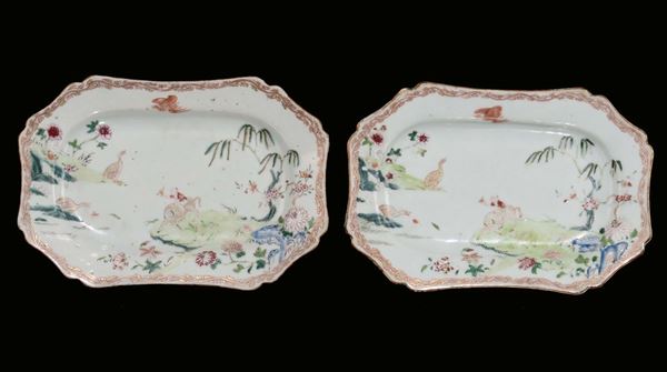 A pair of small polychrome Famille-Rose porcelain dishes with oriental landscape decoration, China, Qing Dynasty,  late 19th century