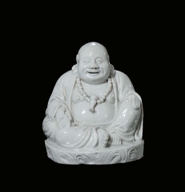 A Blanc de Chine porcelain figure of Budai, China, Qing Dynasty, 19th century