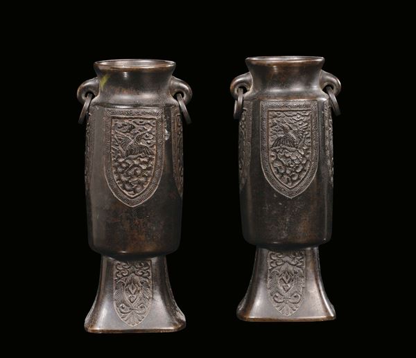 A pair of bronze cylindrical carved vases, China, Qing Dynasty, 18th century