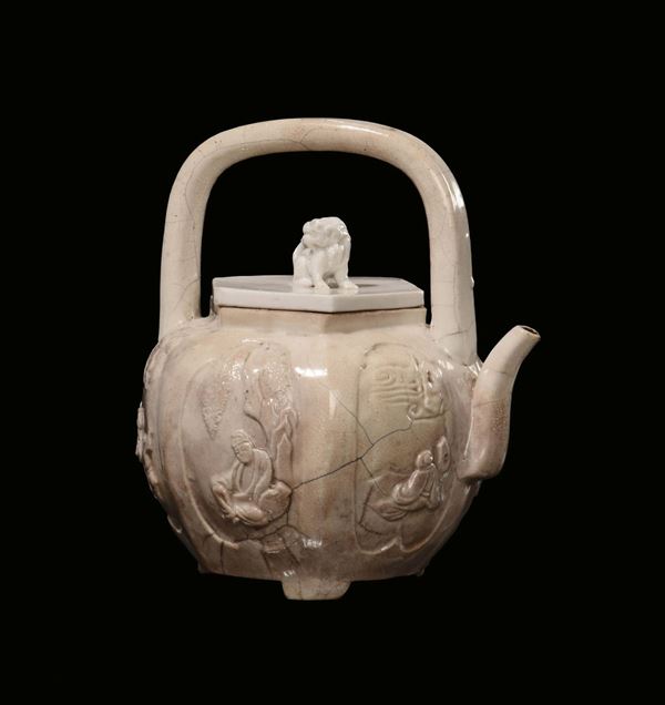 A Blanc de Chine porcelain teapot with relief figure, Dehua, China late 17th century