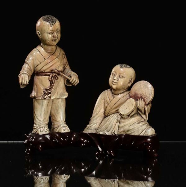 Due figure bambini in avorio, Cina