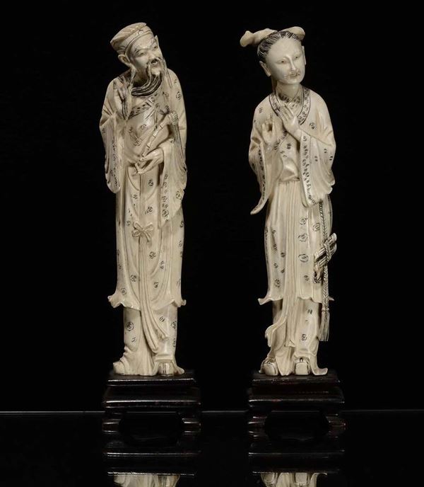 Lotto di due sculture in avorio scolpite, Cina, XX secolo
