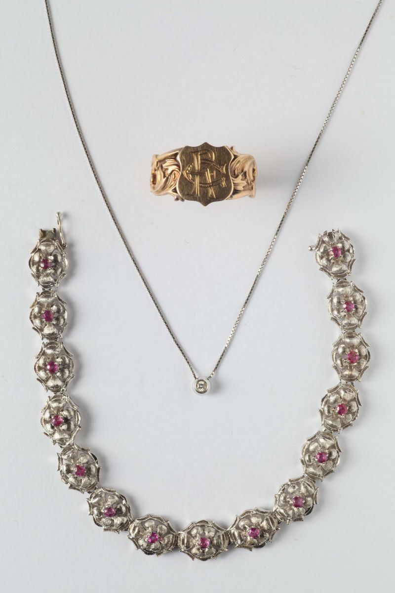 Lotto composto da anello, bracciale e pendente con piccolo diamante  - Asta Gioielli e Orologi Antichi e Conemporanei - Cambi Casa d'Aste
