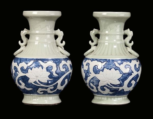 A pair of Celadon porcelain and light-blue enamels vases, apocryphal Quianlong mark, China, Qing Dynasty, 19th century