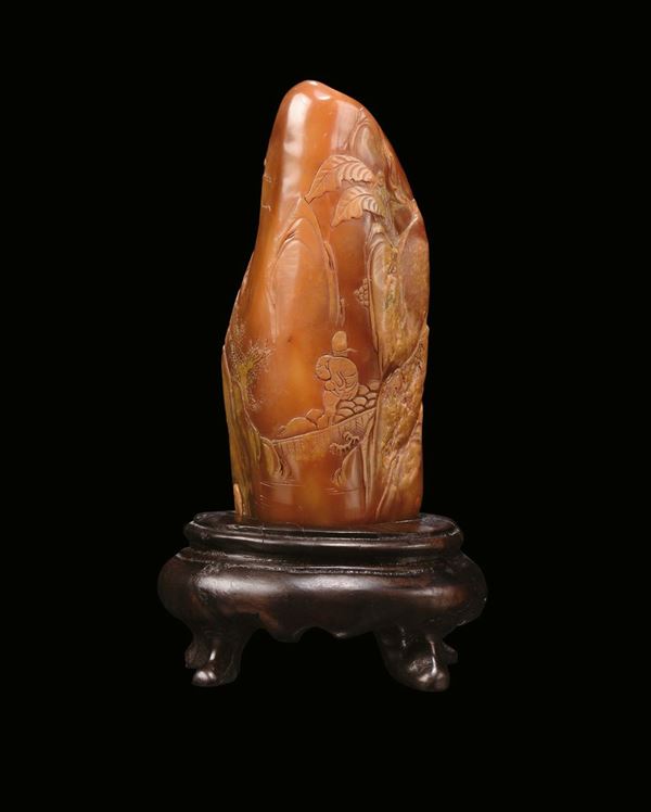 A carnelian agate mountain  with landscapes, figures and inscriptions, China, Qing Dynasty, 19th century