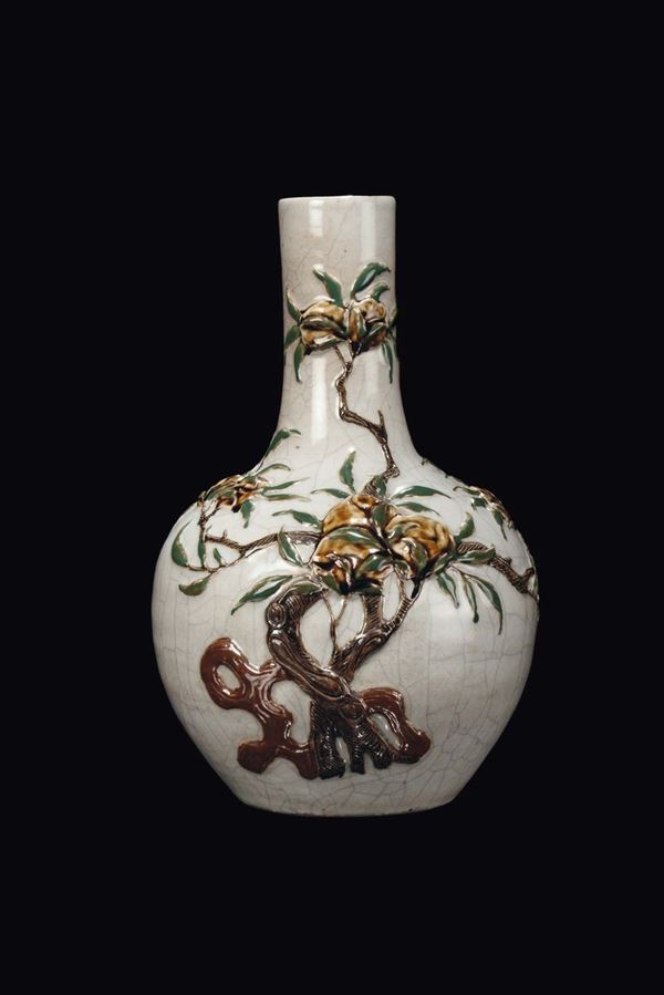 A Guan vase with relief pomegranates and polychrome enamels, China, Qing Dynasty, Daoguang Period (1821-1850)