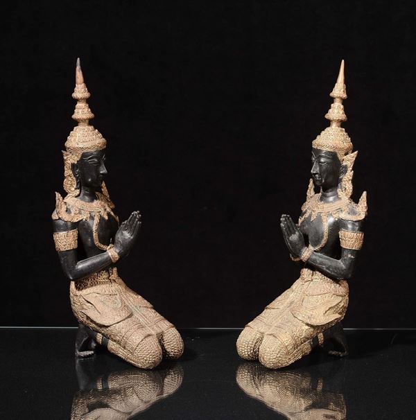 Due divinità in bronzo brunito e dorato, Tibet