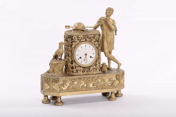 Pendola da tavolo in bronzo dorato con fanciullo e cagnolino, Lione, XIX secolo