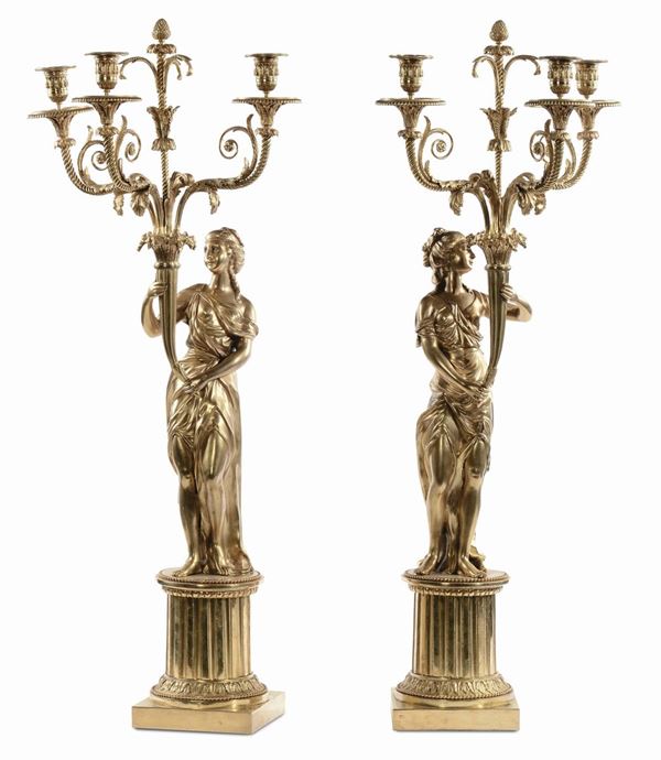 LOTTO RITIRATO Coppia di grandi candelabri a quattro fiamme in bronzo dorato, XIX secolo