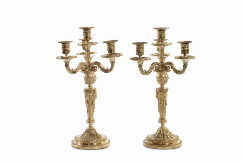 Coppia di candelabri in bronzo dorato a quattro luci  - Auction Antique and Old Masters - Cambi Casa d'Aste