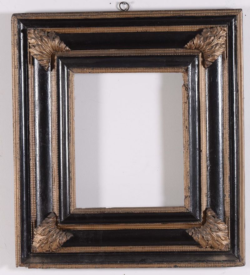Cornice in legno ebanizzato e dorato, Olanda XVII secolo  - Auction Antique and Old Masters - Cambi Casa d'Aste