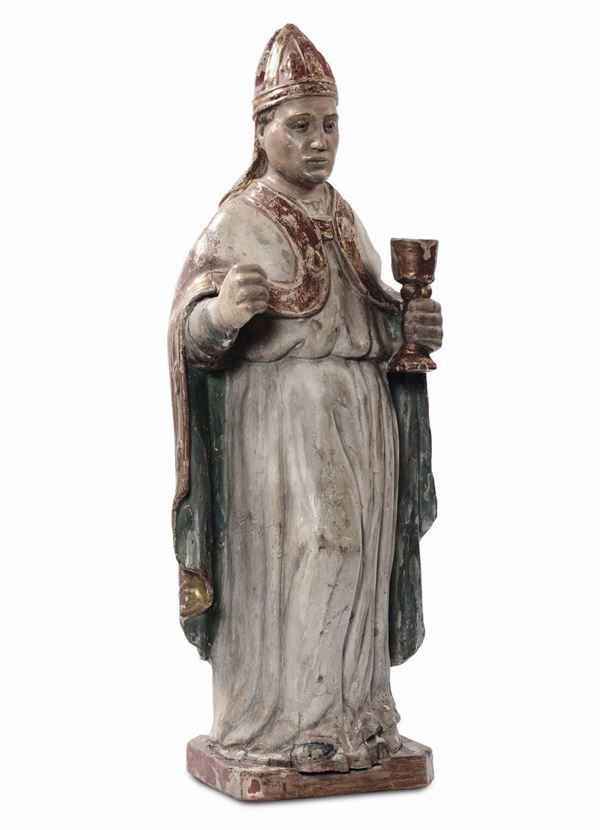 A polychrome and gilt wood sculpture representing a Saint Bishop, Italian school, 16th century