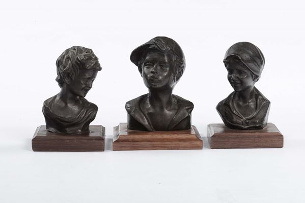 Tre sculture in bronzo due raffiguranti busti di bimbi ed una busto femminile