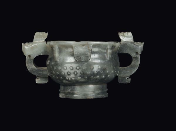 A green jade carved in archaic style , China, Ming Dynasty, 15th century