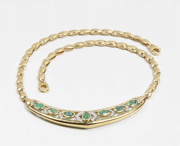 An emerald, diamond and gold necklace