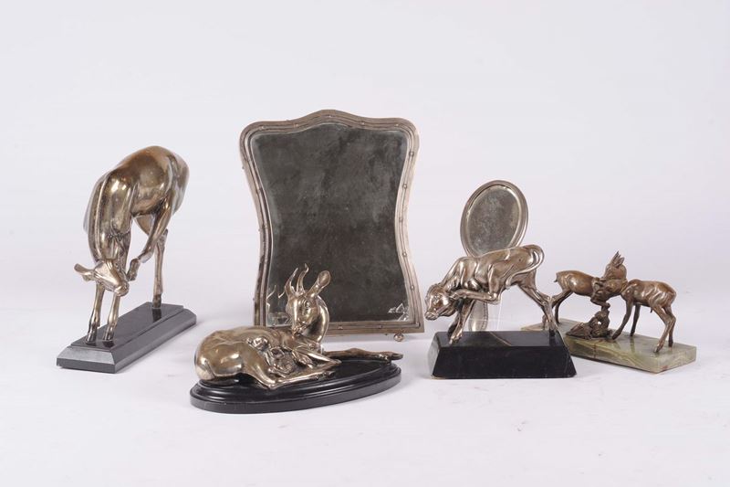Lotto   composto da scultura in bronzo raff. cerbiatto, tre sculture in argento raff. cerbiatto, due specchiere in argento.  - Asta Argenti e Gioielli - Cambi Casa d'Aste
