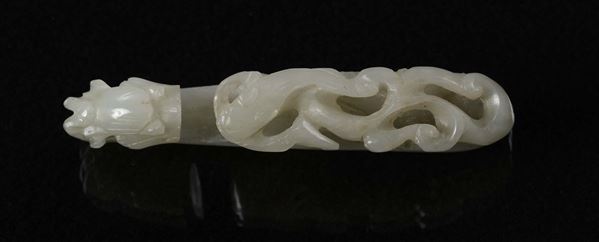 A withe jade small dragon buckle, China, Qing Dynasty, Qianlong period (1736-1796)