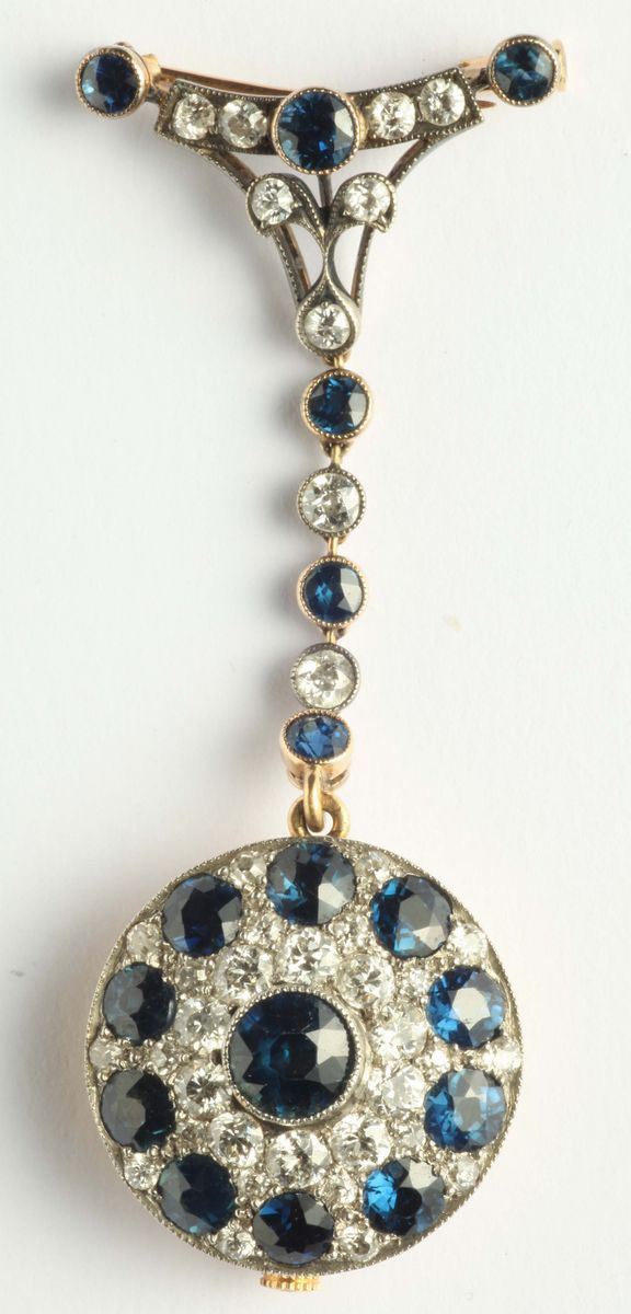 A diamond and sapphire lady's lapel brooch