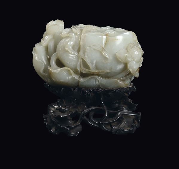 A fine Celadon white jade and russet “lotus flower” group, China, Qing Dynasty, Qianlong period (1736 [..]