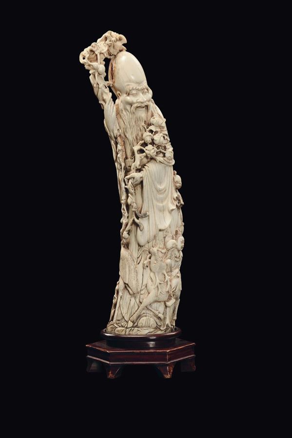 A large ivory sculpture of dignitary, China, Qing Dynasty, 19th century
