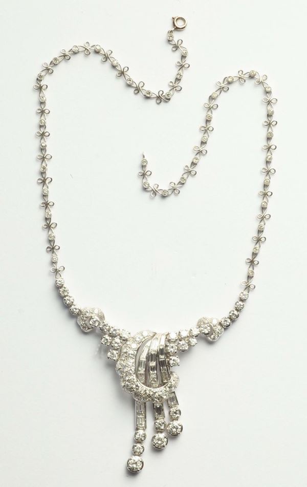 A round-cut and baguette diamond necklace