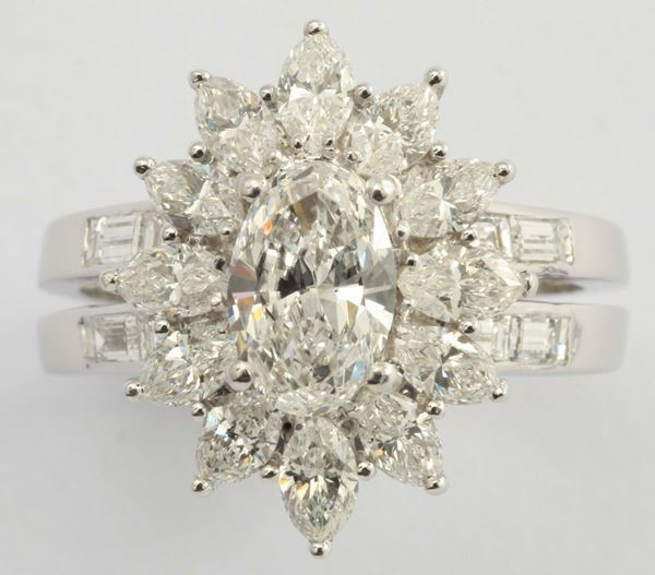 An oval cut diamond ring