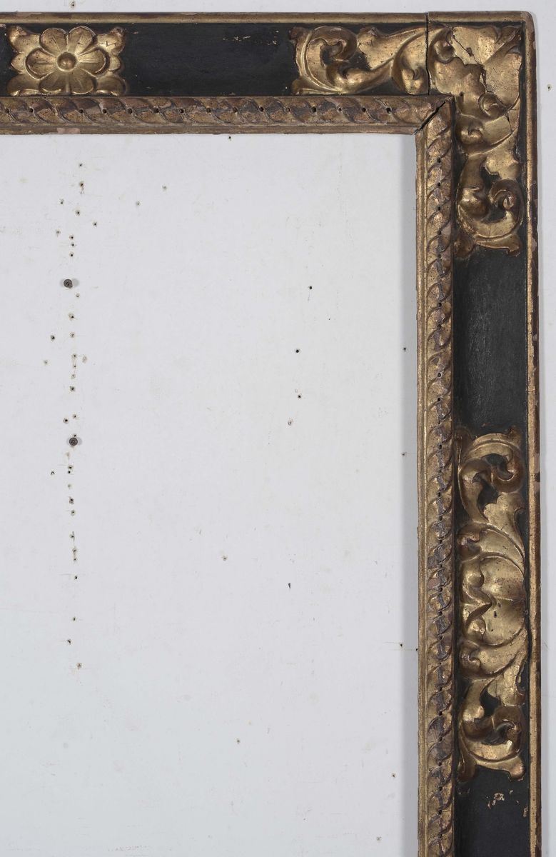 Cornice in legno dorato, ebanizzato e intagliato, Lombardia XVII secolo  - Asta Cornici Antiche - Cambi Casa d'Aste