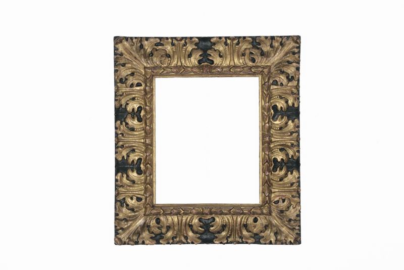Cormice in legno ebanizzato, dorato e scolpito, XVII secolo  - Auction Antique Frames - Cambi Casa d'Aste