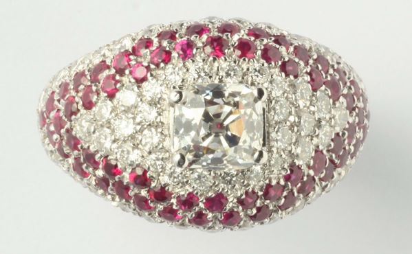 A diamond, ruby and gold ring