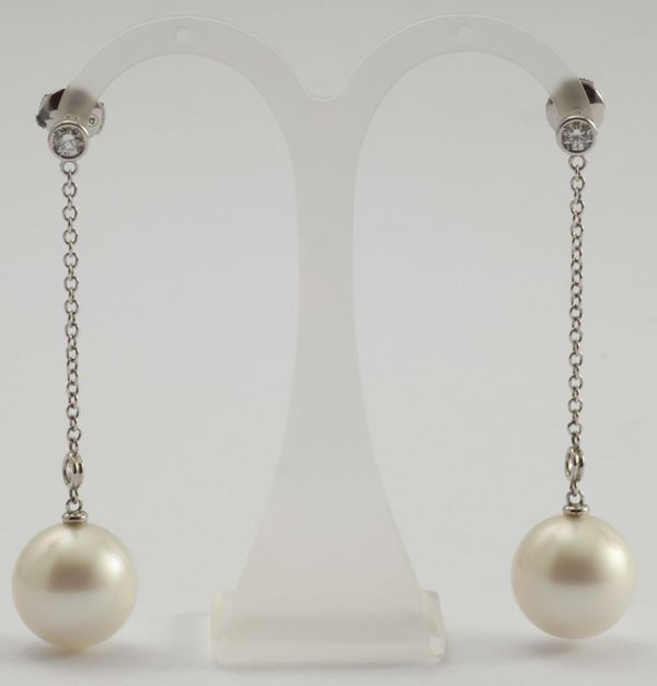 Faraone. A pair of cultured pearl and diamond pendent earrings
