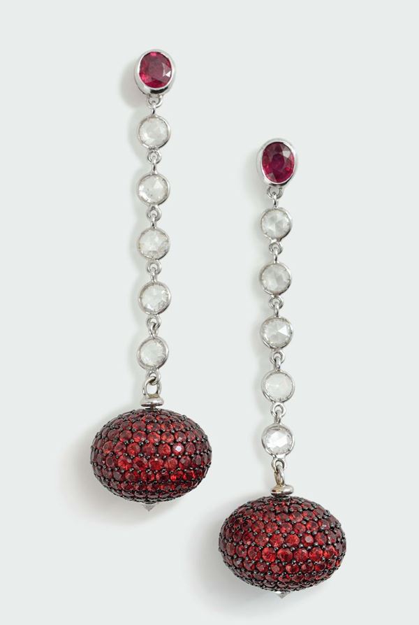 Faraone. A pair of ruby and diamond pendant earrings