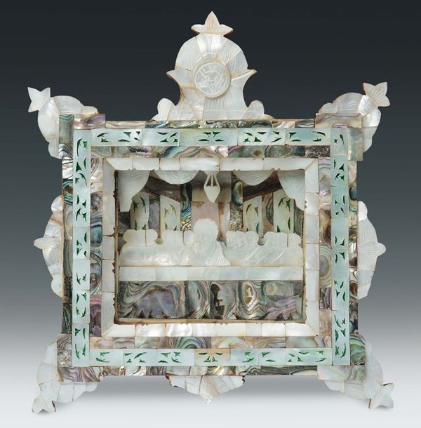A mother-of-the-pearl and olive wood frame with sculpted “the Last Supper” in mother-of -the-pearl, Italy or the Holy Land, 19th - 20th century