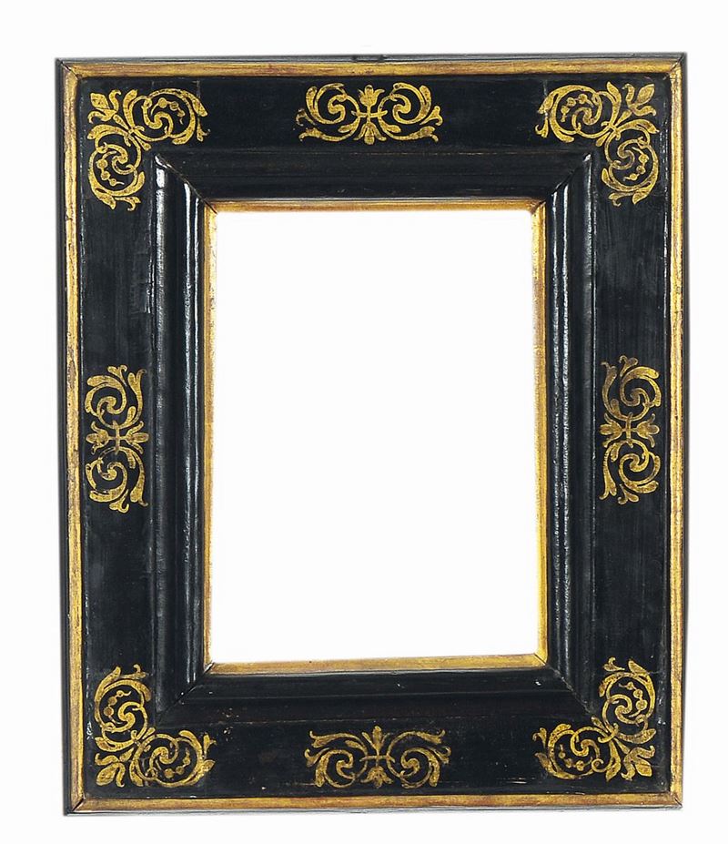 Cornice a cassetta in legno ebanizzato con decorazioni dorate, Toscana XVI secolo  - Auction Antique Frames - Cambi Casa d'Aste