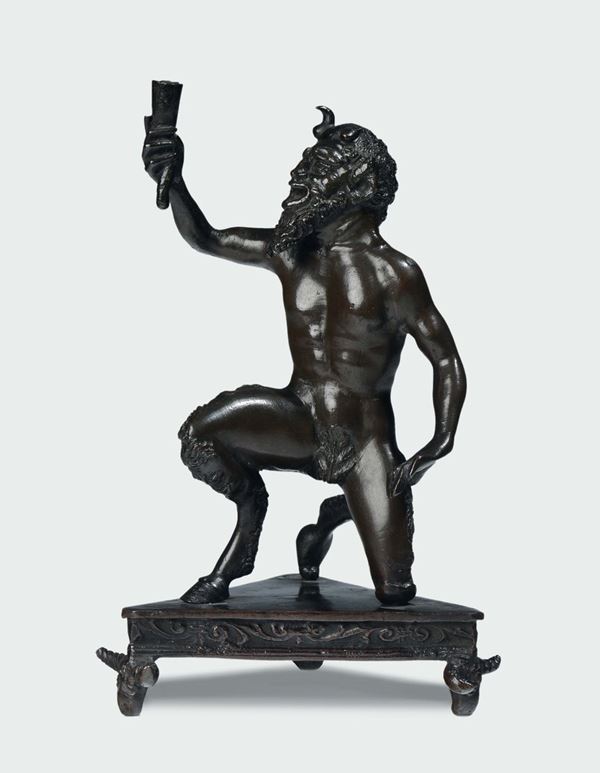 A molten and chiselled bronze satire-shaped candlestick, Padua workshop, circle of Riccio, 16th century