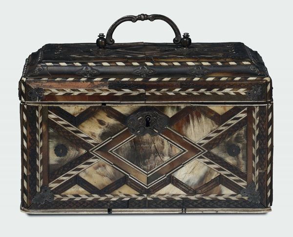 A small box veneered with ivory and horn with geometrical decorations, forged iron handles, French workers, 17th - 18th century