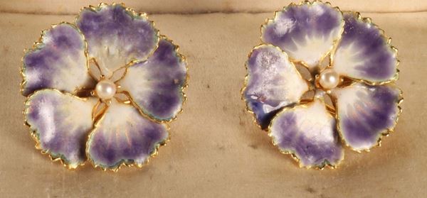 A pair of enamel and gold earrings