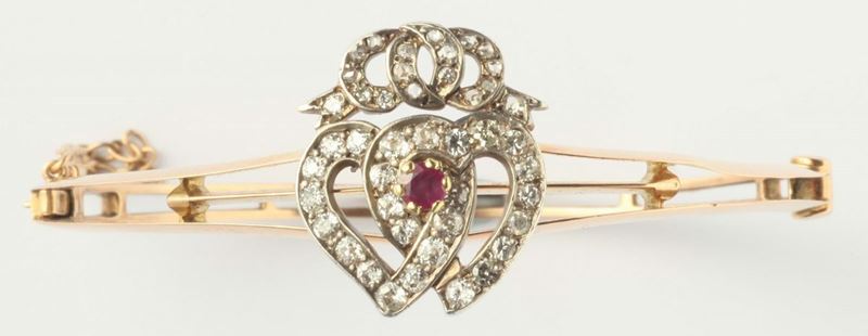 A diamond and ruby heart bangle  - Auction Fine Jewels - I - Cambi Casa d'Aste