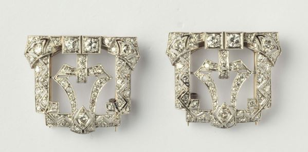 A pair of old cut diamond and platinum brooch
