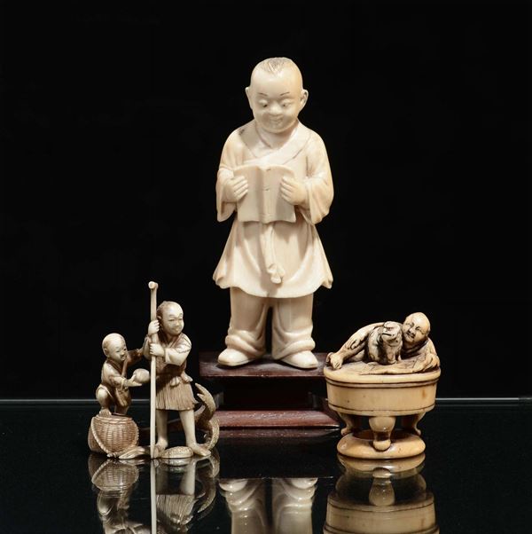 A lot of two ivory netsuke and child, Japan, early 20th century