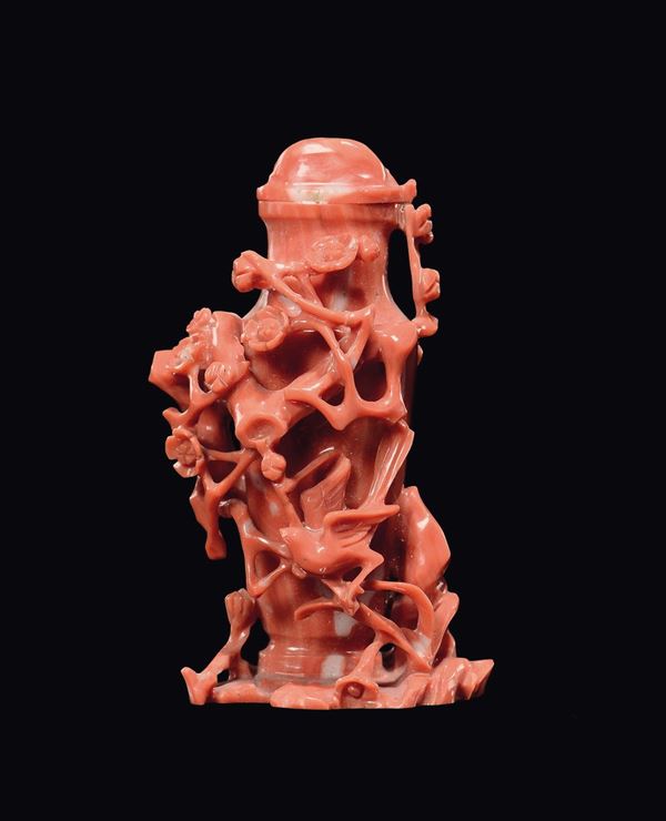 A small red coral vase with floral relief decoration, China, early 20th century