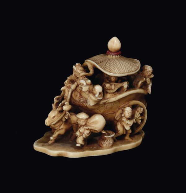 An ivory netsuke with figures and musicians, Japan, late 19th century