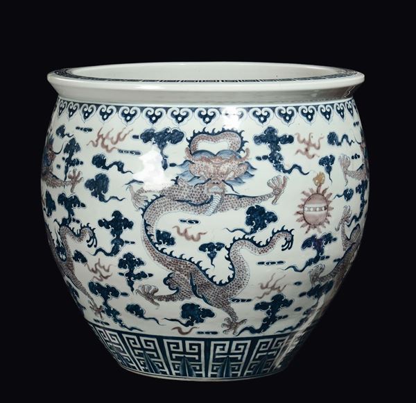 A large polychrome porcelain cahepot with pink dragons, China, 20th century