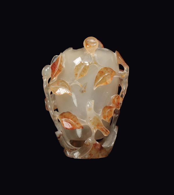 A small carved yellow and white agate vase with leaves in relief, China, Qing Dynasty, late nineteenth century