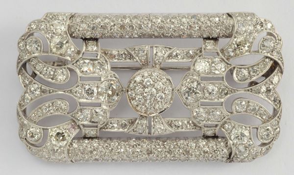 A diamond and platinum brooch