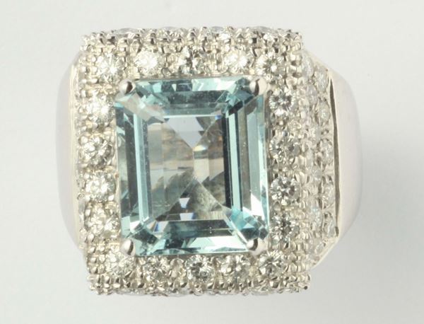 An acquamarine and diamond ring