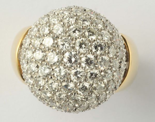 A pavé diamond and gold ring