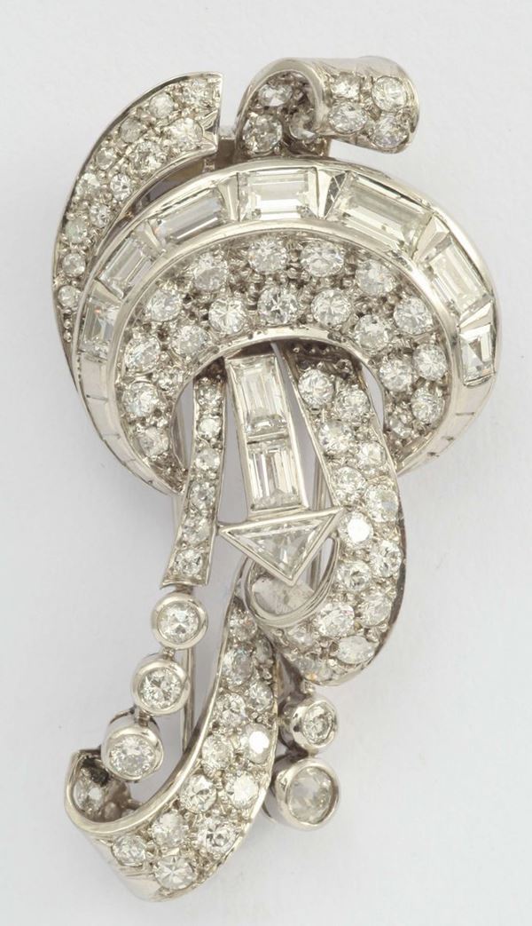 A diamond and gold brooch. 1950