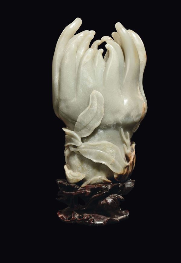 A Celadon jade Buddha hand, China, Ming Dynasty, late 17th century